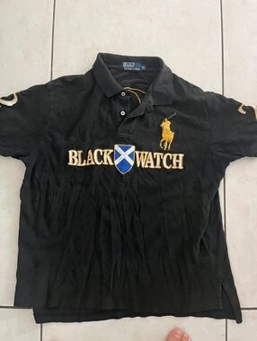 Ralph Lauren Black Polo with Gold Embroidery and Blue Shield Used.